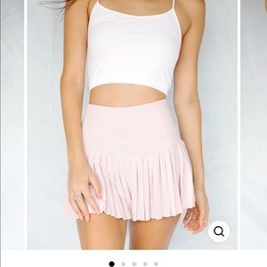 Baby pink pleated tennis skirt